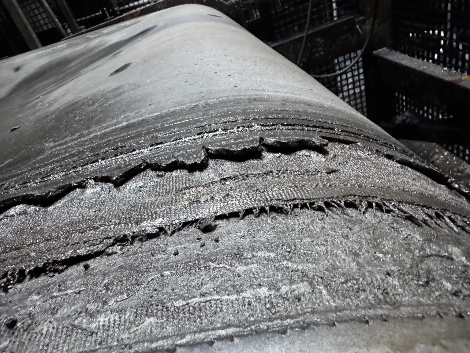Belt-cover damage recorded during an inspection.